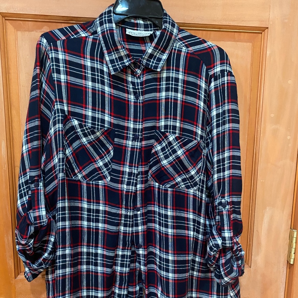 Flannel button up top excellent condition. Size large has split back.